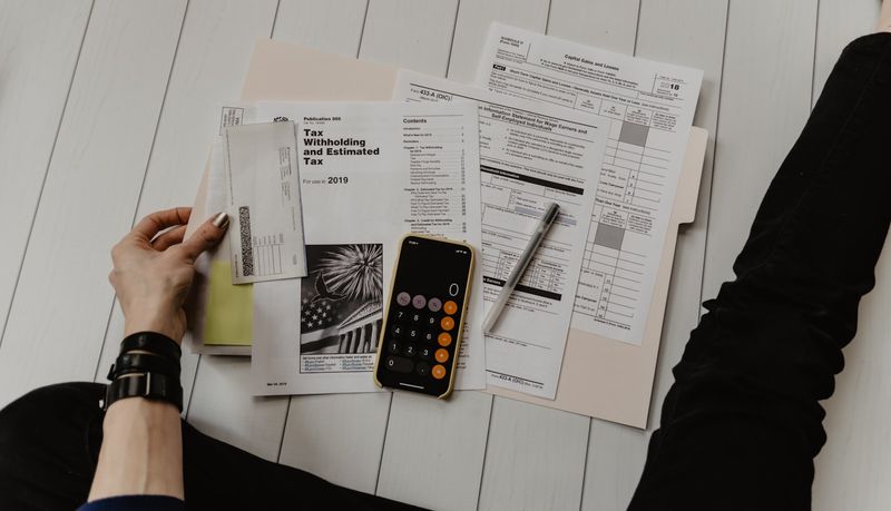 KTAN CPA advisor reviewing tax planning documents with a small business owner in San Antonio, TX